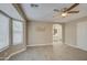 Bright bedroom with bay window and ceiling fan at 1633 S 171St Dr, Goodyear, AZ 85338