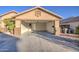 Attached garage with ample space for parking and storage at 1633 S 171St Dr, Goodyear, AZ 85338