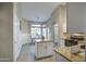 Kitchen with granite countertops and white cabinets at 1633 S 171St Dr, Goodyear, AZ 85338