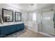 Elegant bathroom with a double vanity and soaking tub at 17338 W Woodrow Ln, Surprise, AZ 85388