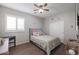 Cozy bedroom with wood floors and a double bed at 17338 W Woodrow Ln, Surprise, AZ 85388