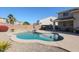 Refreshing kidney-shaped pool in a private backyard at 17338 W Woodrow Ln, Surprise, AZ 85388