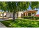 House exterior showcasing a well-manicured lawn and driveway at 18881 N 91St Dr, Peoria, AZ 85382