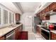 Kitchen features stainless steel appliances and ample counter space at 18881 N 91St Dr, Peoria, AZ 85382