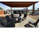 Relaxing backyard patio with covered seating area and fire pit at 1922 N 25Th St, Phoenix, AZ 85008