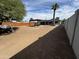 Large backyard with covered patio and grassy area at 1922 N 25Th St, Phoenix, AZ 85008