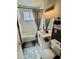 A modern bathroom featuring subway tile, a new vanity, and contemporary fixtures at 1922 N 25Th St, Phoenix, AZ 85008