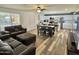 Open-concept living and dining space leading to a bright kitchen with stainless steel appliances at 1922 N 25Th St, Phoenix, AZ 85008