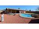 Inviting kidney-shaped pool with waterfall feature and patio at 19624 N 16Th Dr, Phoenix, AZ 85027