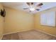 Bedroom with ceiling fan and window shutters at 19624 N 16Th Dr, Phoenix, AZ 85027