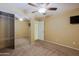 Bedroom with mirrored closet and ceiling fan at 19624 N 16Th Dr, Phoenix, AZ 85027