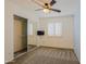 Bright bedroom with ceiling fan and mirrored closet at 19624 N 16Th Dr, Phoenix, AZ 85027