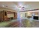 Living room with hardwood floors and kitchen view at 19624 N 16Th Dr, Phoenix, AZ 85027