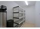 Storage room with shelving for extra storage at 19624 N 16Th Dr, Phoenix, AZ 85027