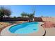 Refreshing kidney-shaped pool in a sunny backyard at 19624 N 16Th Dr, Phoenix, AZ 85027