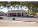 Large backyard featuring a covered patio and gravel landscaping at 20825 N Limousine Dr, Sun City West, AZ 85375