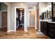 Main bathroom with walk-in closet and double vanity at 20825 N Limousine Dr, Sun City West, AZ 85375