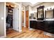 Bathroom with double vanity, walk-in closet and toilet at 20825 N Limousine Dr, Sun City West, AZ 85375