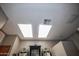 Bathroom with skylights and a modern double vanity at 20825 N Limousine Dr, Sun City West, AZ 85375