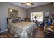 Bright bedroom with a comfortable bed and plenty of natural light at 20825 N Limousine Dr, Sun City West, AZ 85375