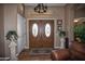 Interior entryway with double doors at 20825 N Limousine Dr, Sun City West, AZ 85375