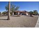 One-story home with a large front yard and desert landscaping at 20825 N Limousine Dr, Sun City West, AZ 85375