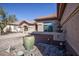 Elegant home exterior with courtyard fountain at 20825 N Limousine Dr, Sun City West, AZ 85375