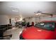 Two-car garage with storage and a vehicle at 20825 N Limousine Dr, Sun City West, AZ 85375