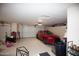 Two-car garage with ample storage cabinets and space for a vehicle at 20825 N Limousine Dr, Sun City West, AZ 85375