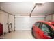 Two-car garage with overhead door and storage at 20825 N Limousine Dr, Sun City West, AZ 85375