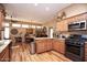 Spacious kitchen with granite countertops and stainless steel appliances at 20825 N Limousine Dr, Sun City West, AZ 85375