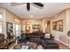 Living room with comfortable seating and access to backyard at 20825 N Limousine Dr, Sun City West, AZ 85375