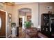 Living room with hardwood floors and view into office at 20825 N Limousine Dr, Sun City West, AZ 85375