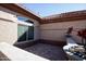 Small brick patio adjacent to house at 20825 N Limousine Dr, Sun City West, AZ 85375