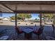 Patio seating area with fire pit and view of golf course at 20825 N Limousine Dr, Sun City West, AZ 85375