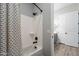 Clean bathroom with a tub shower, updated fixtures and gray walls at 21097 E Sparrow Dr, Queen Creek, AZ 85142