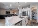 Modern kitchen with stainless steel appliances and an island at 21097 E Sparrow Dr, Queen Creek, AZ 85142