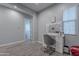 Stylish vanity area with a large mirror and comfortable chair at 21097 E Sparrow Dr, Queen Creek, AZ 85142