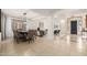 Formal dining room with a large table and chairs, located near living room at 2128 E Leo Pl, Chandler, AZ 85249