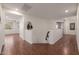 Upstairs hallway with wood flooring and access to bedrooms at 2128 E Leo Pl, Chandler, AZ 85249