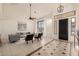 Bright living room with high ceilings, gray sofas, and a decorative tiled entryway at 2128 E Leo Pl, Chandler, AZ 85249