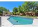 Inviting backyard pool with a large grassy area at 2128 E Leo Pl, Chandler, AZ 85249