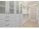 Large walk-in closet with ample shelving and drawers at 2128 E Leo Pl, Chandler, AZ 85249