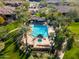 Community pool and spa with surrounding green areas at 21320 N 56Th St # 1175, Phoenix, AZ 85054