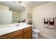 Guest bathroom with single sink, toilet and shower at 21320 N 56Th St # 1175, Phoenix, AZ 85054