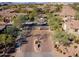 Gated entrance to the community with landscaping and palm trees at 21320 N 56Th St # 1175, Phoenix, AZ 85054