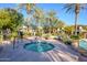 Relaxing community hot tub surrounded by palm trees at 21320 N 56Th St # 1175, Phoenix, AZ 85054