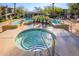 Relaxing community hot tub next to the pool and lounge area at 21320 N 56Th St # 1175, Phoenix, AZ 85054