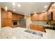 Well-equipped kitchen featuring granite countertops and stainless steel appliances at 21320 N 56Th St # 1175, Phoenix, AZ 85054