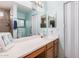 Well-lit bathroom featuring a sink and vanity with a large mirror at 2172 W Pinkley Ave, Coolidge, AZ 85128